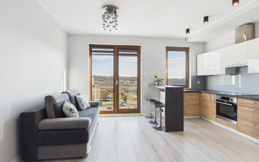 Jasna kawalerka z balkonem i pięknym widokiem